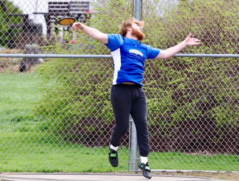 Princeton senior Ian Morris launches the discus in Monday's Ferris Invite. He took first place.