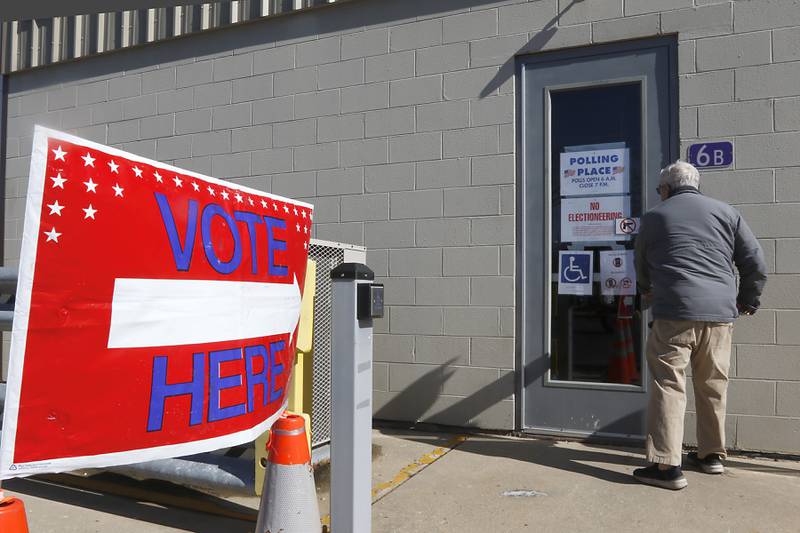 A voter walk into the Algonquin Township Office at 3702 Route 14 in Crystal Lake, to vote on Tuesday, Feb. 25, 2025, in the Republican primary election.