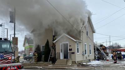 Firefighters battle DeKalb duplex fire in frigid temperatures Saturday
