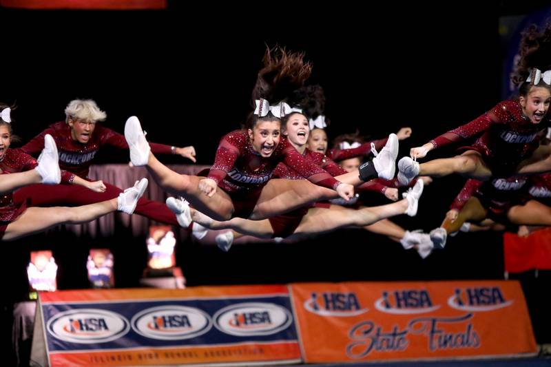 Members of the Lockport cheerleading team compete in the large team division of the IHSA State Finals on Saturday, Feb. 8, 2025 at Grossinger Motors Arena in Bloomington.