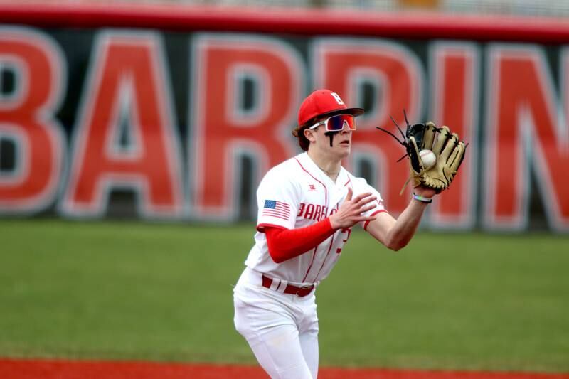 Barrington’s Will Nazha fields an infield bouncer against Huntley in varsity baseball at Barrington Saturday.