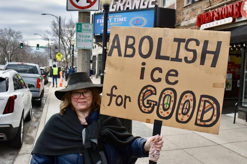 Laura K. Johnson was one of nearly 900 people to participate Sunday in a protest against ICE and the Trump administration held in downtown La Grange.