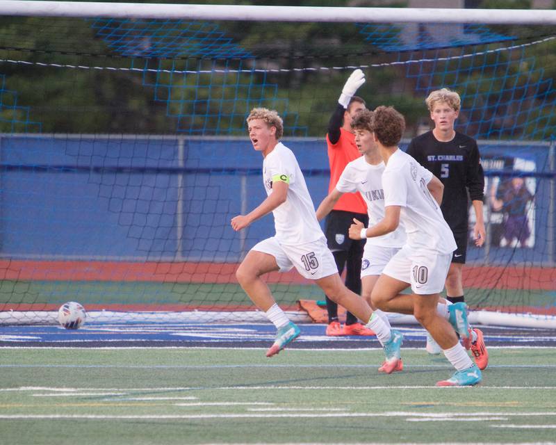 Geneva's Ben Murphy (15) scores a goal against St. Charles North on Tuesday, Sept. 9,2025 in St. Charles.