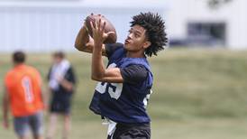 Oswego track star Dontrell Young sticks with football, set for return to field