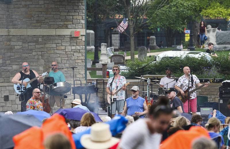 Johnny Russler & The Beach Bum Band perform during the annual Summer Concert Series at Fishel Park in Downers Grove July 2.