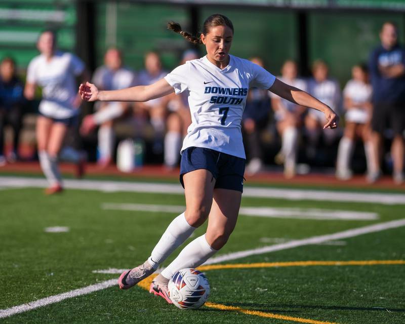 Downers Grove South's Sadie Rhoads (7) kicks the ball to a teammate during the regional title game on Friday May 23, 2025, while taking on York held at York High School.