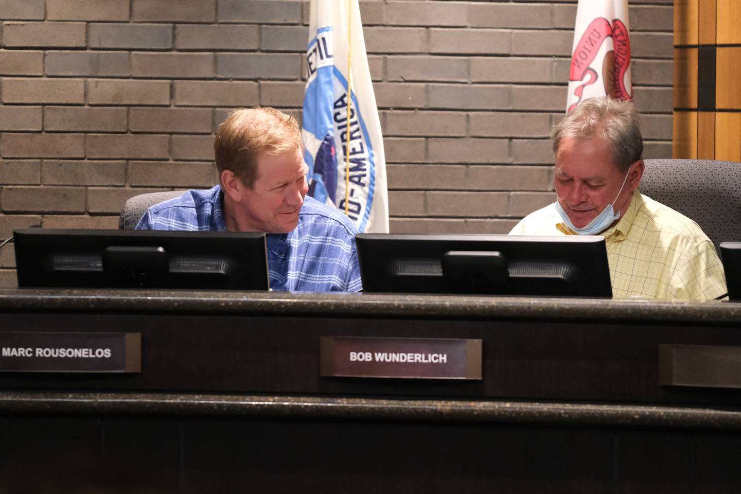 Board members Marc Rousonelos (left) and Bob Wunderlich at the Joliet Plan Commission meeting regarding NorthPoint's development of the Compass Business Park. Thursday, Nov.18, 2021 in Joliet.
