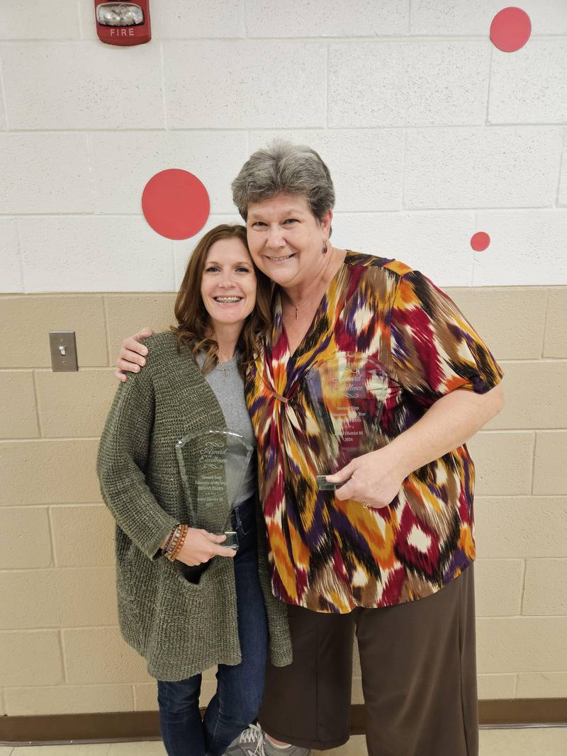 Farragut School social worker Megan Palka (left) and Farragut Principal Joy Hopkins in Joliet Public Schools District 86 received the Second Step Educator of the Year award.