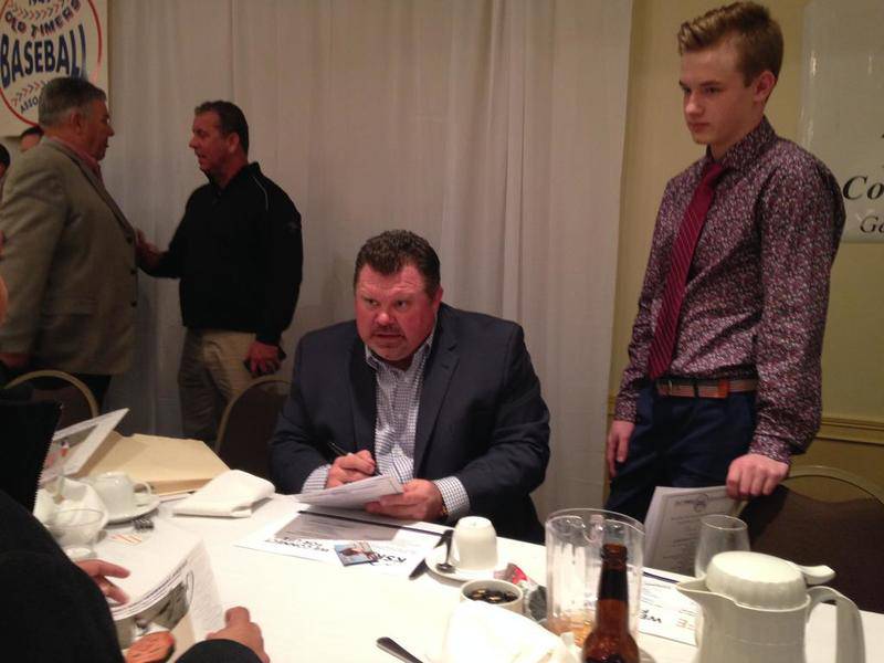 Ron Coomer signs autographs following the Old Timers Baseball Association of Will County banquet at the Clarion Hotel.