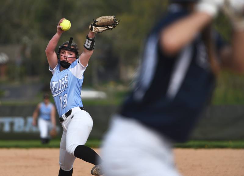 Willowbrook pitcher Caitlyn Kulczyski throws to an Addison Trail batter during Wednsday's softball game in Villa Park.