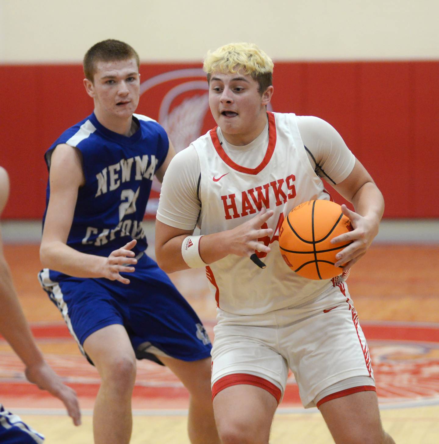 Oregon's Kade Girton (34) makes a move to the basket against Newman on Monday, Nov. 25, 2024 at the Oregon Thanksgiving Tournament at the Blackhawk Center in Oregon.