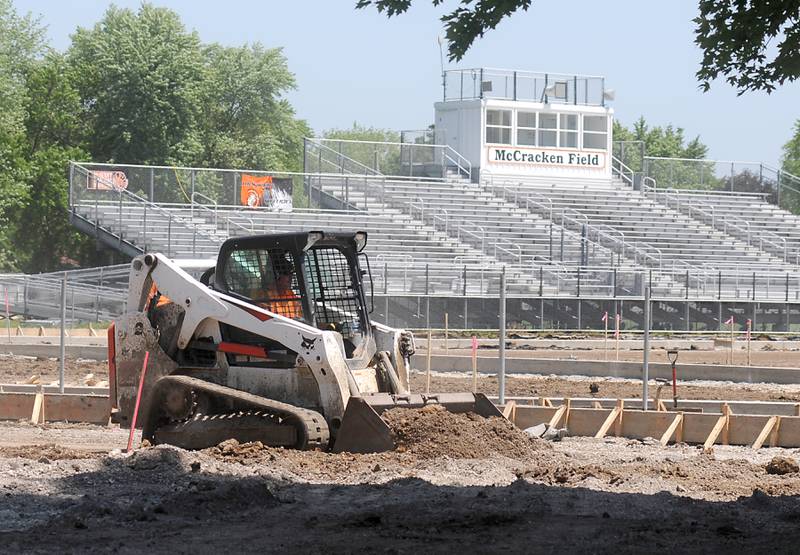 Workers from Herrera Construction work on setting up forms for concrete Tuesday, June 14, 2022, while upgrading McCracken Athletic Field in McHenry.