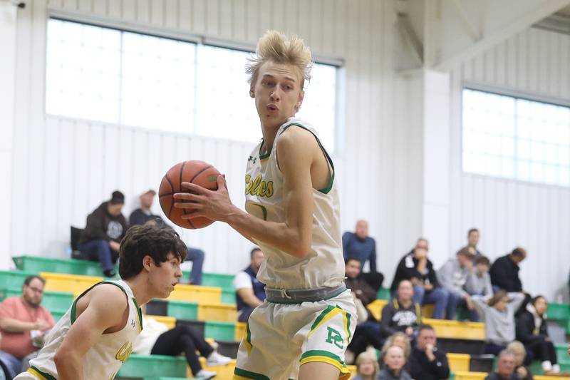 Providence’s Kyle Lipke pulls in a rebound against Joliet Catholic on Saturday, Dec. 9th, 2023 in New Lenox.