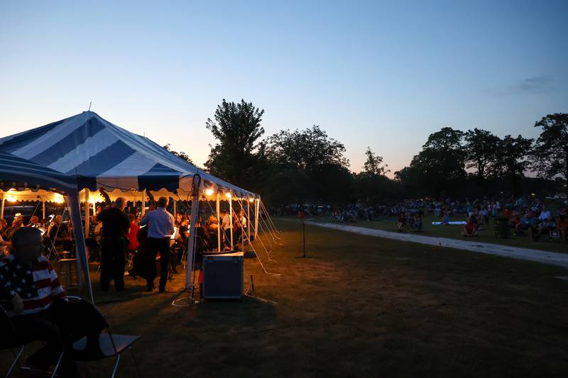 The Kankakee Valley Symphony Orchestra performs ahead of the city of Kankakee's fireworks show at Kankakee Community College on Friday, July 4, 2025.