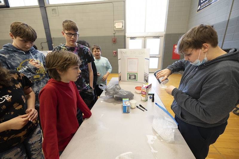 Challand Middle School eighth grader Eric Allen mixes up  homemade ice cream to the delight of his fellow classmates during the STEM exhibit Thursday, March 9, 2023. Eight grade STEM teacher Jim Shamp and sixth grade STEM teacher Logan Shearer oversaw the inaugural exhibit.