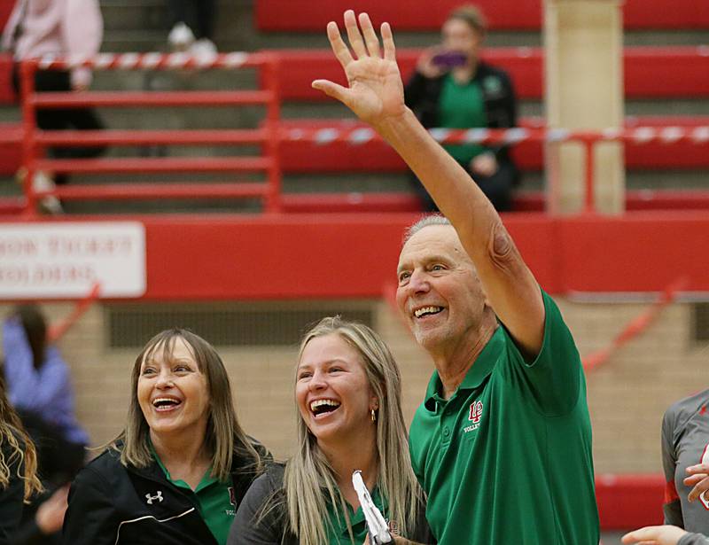 L-P head coach Mark Haberkorn waves to the fans after getting his 1,000th career win against Ottawa on Tuesday, Oct. 18, 2022 at Kingman Gymnasium in Ottawa. Only four other volleyball coaches have had over 1,000 wins.