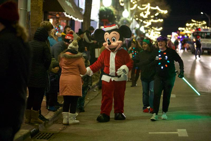 Santa Mickey participates in the Frosty & Friends Parade at the Holly Days Winter Festival on Saturday, Dec. 3,2022 in Westmont.