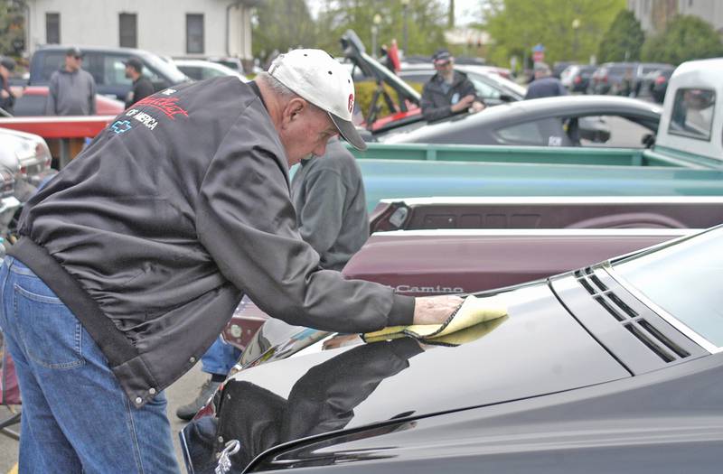 Ro Bartschey of Port Byron polishes his '67 Buick Riviera. Sterling Main Street's 12th Annual Car Show took place at the Sterling Marketplace on Sunday, May 4th, 2025.