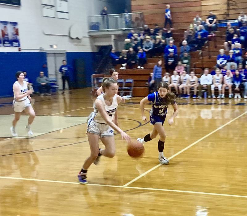 Princeton's Keighley Davis brings the ball up against Newman Thursday night at Prouty Gym. The Tigresses scored a key 45-39 to move to 7-1 atop the Three Rivers East.