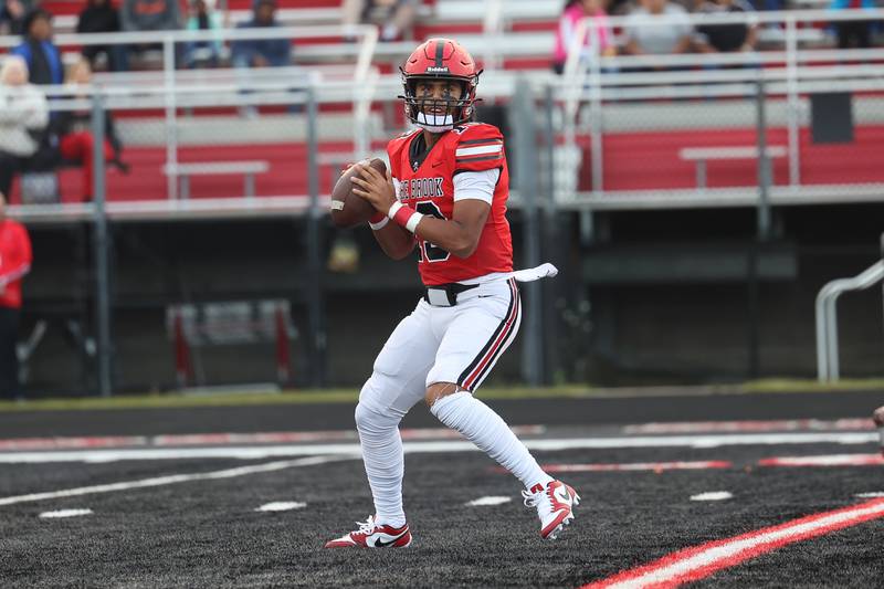 Bolingbrook’s Jonas Williams looks to pass against Naperville North on Friday, Sept. 8, 2023 in Bolingbrook.