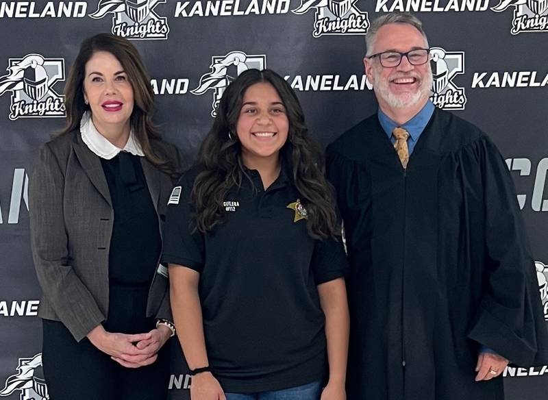 Kaneland junior Isabel Aguilera's (center) was one of six essays that won the Kane County May 1 Law Day contest, 'The Constitution’s Promise: Out of Many, One.' Kane Circuit Judges Kimberly DiGiovanni and  D.J. Tegeler presented the award to her at Kaneland High School.
