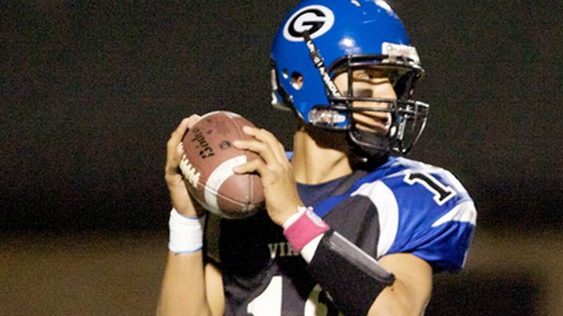 Geneva’s Matt Williams looks to throw against South Elgin on Friday in Geneva. The Vikings knocked off South Elgin, 31-28, on a Ben Moore game-winning field goal as time expired. (Photo by Karen Naess – For Kane County Chronicle)