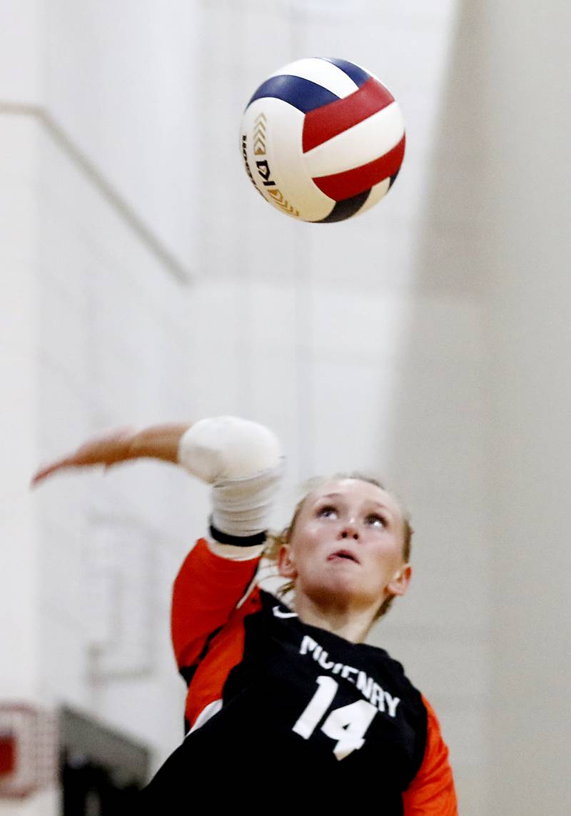 McHenry's Madyson Weber serves the ball during a nonconference volleyball match against Marian Central  Monday, Aug. 28, 2023, at Marian Central Catholic High School.
