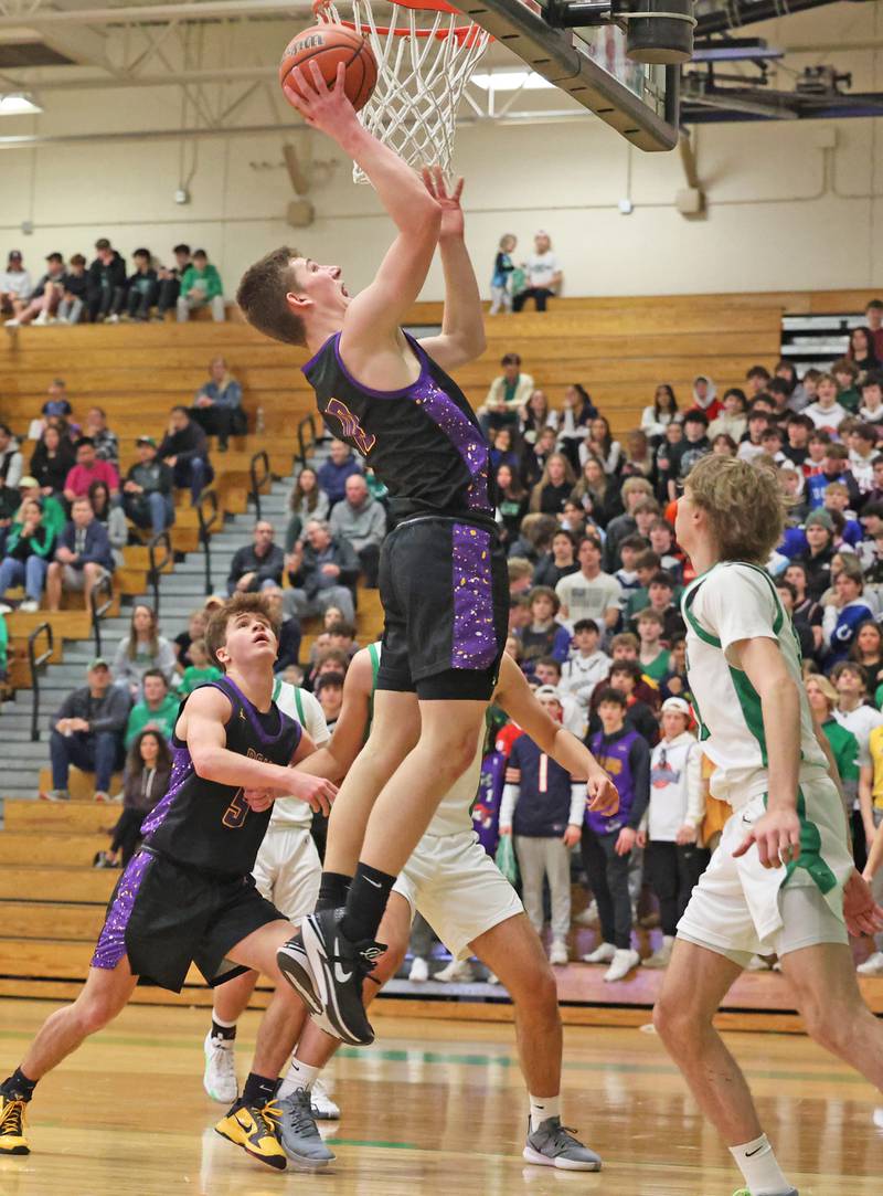 Downers Grove North’s Bobby Grganto (10) goes up with the ball against Downers Grove North/York during a boys varsity basketball game on Saturday, Feb. 10, 2024 in Elmhurst, IL.