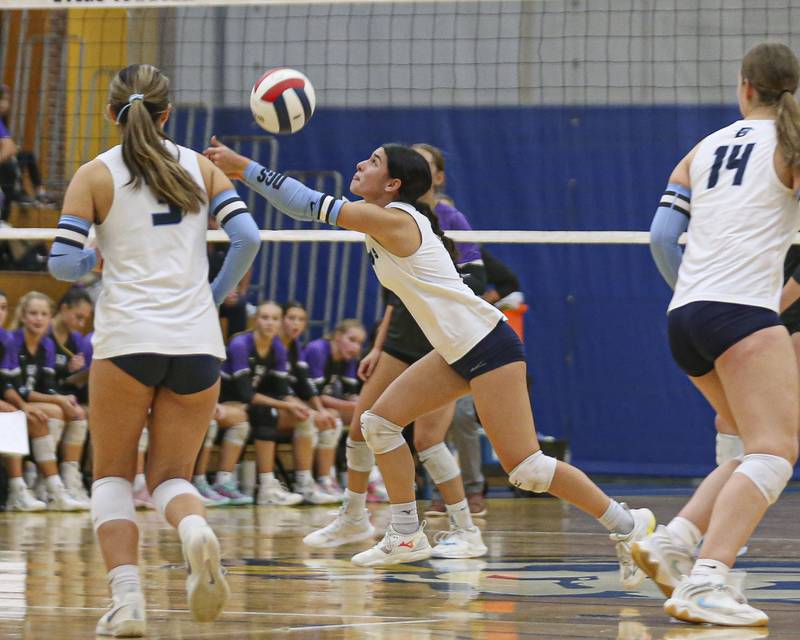 Downers Grove South's Niya Mincheva (1) digs out a spike during Class 4A Lyons Sectional Semifinal volleyball match between Downers Grove South at Downers Grove North. Nov 4, 2025 in La Grange.