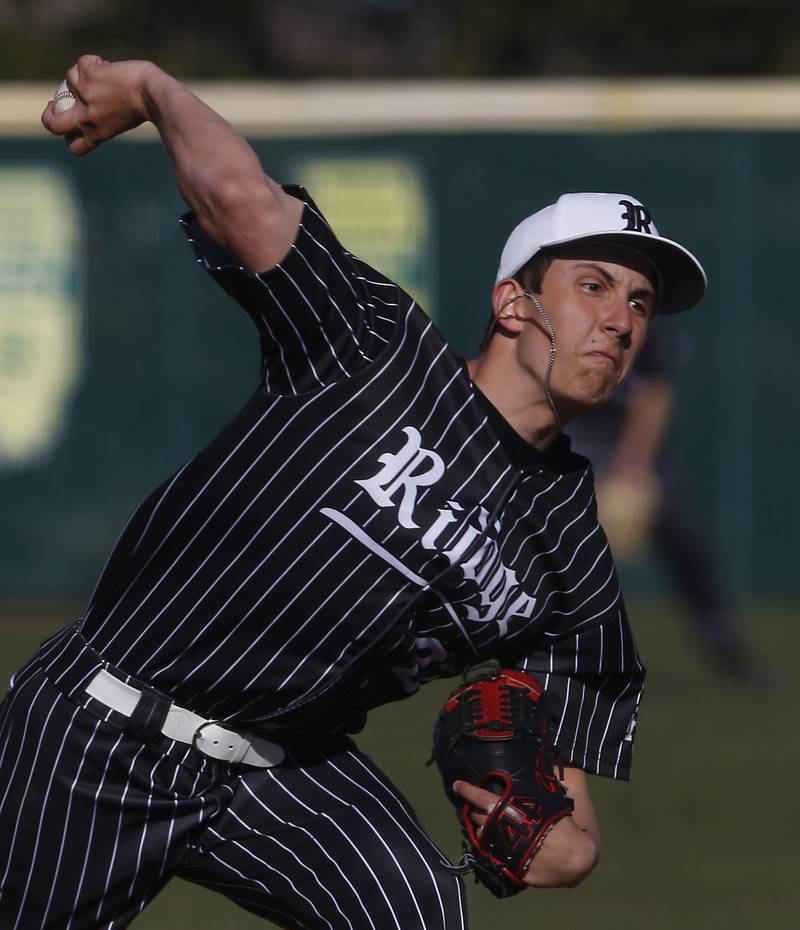 Prairie Ridge's Danny Savas throws pitch during a Fox Valley Conference baseball game against Crystal Lake South on Monday, April 8, 2024, at Crystal Lake South High School.