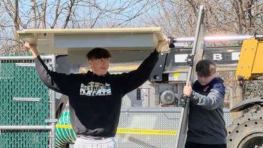 Bishop McNamara students, families come together in storm cleanup, relief