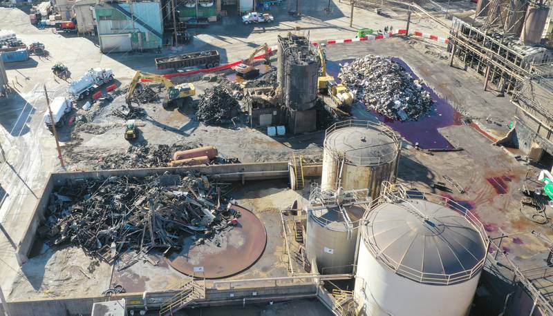 Excavators clean debris from Carus Chemical Company nearly one month after the fire on Friday, Feb. 10, 2023. The fire began on Jan. 11, 2023 and escalated to a fourth Mutual Aid Box Alarm System and brought in more than a dozen fire departments and emergency responders, in addition to the Environmental Protection Agency, Coast Guard and HAZMAT teams.