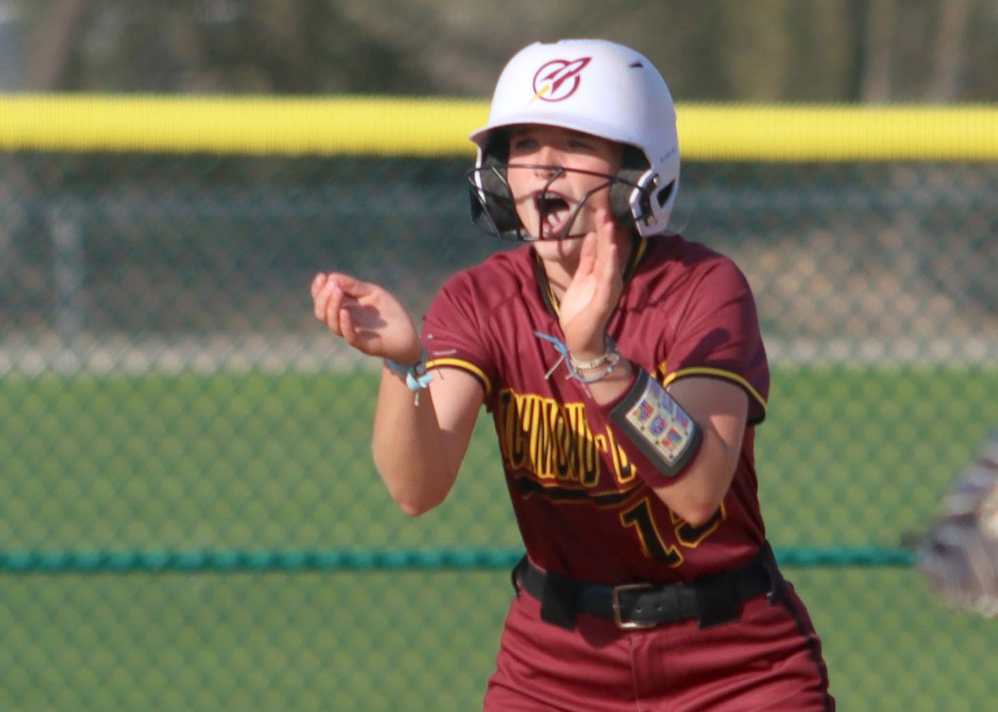 Richmond-Burton’s  Rebecca Lanz gets revved up after landing safely at second base against Marengo in varsity softball on Tuesday, April 22, 2025, at Marengo High School in Marengo.