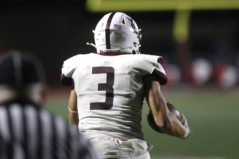 Prairie Ridge's Elijah Loeding makes a game winning interceptions during a Fox Valley Conference football game against Huntley on Friday, Oct. 3, 2025, at Huntley High School.