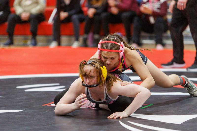 Lincoln Way South's Abby Kunz and Metea Valley's Alketa Picari compete in the championship 140 lb class at the East Aurora Wrestling Regional on Saturday, Feb.7,2026 in Aurora.