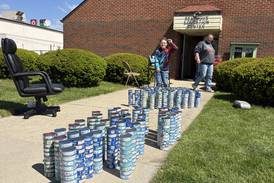 Local boy’s birthday tuna drive brings in record haul for Marseilles pantry