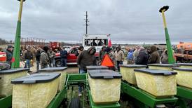 Farmers welcome mud for annual Hazelhurst spring sale near Polo