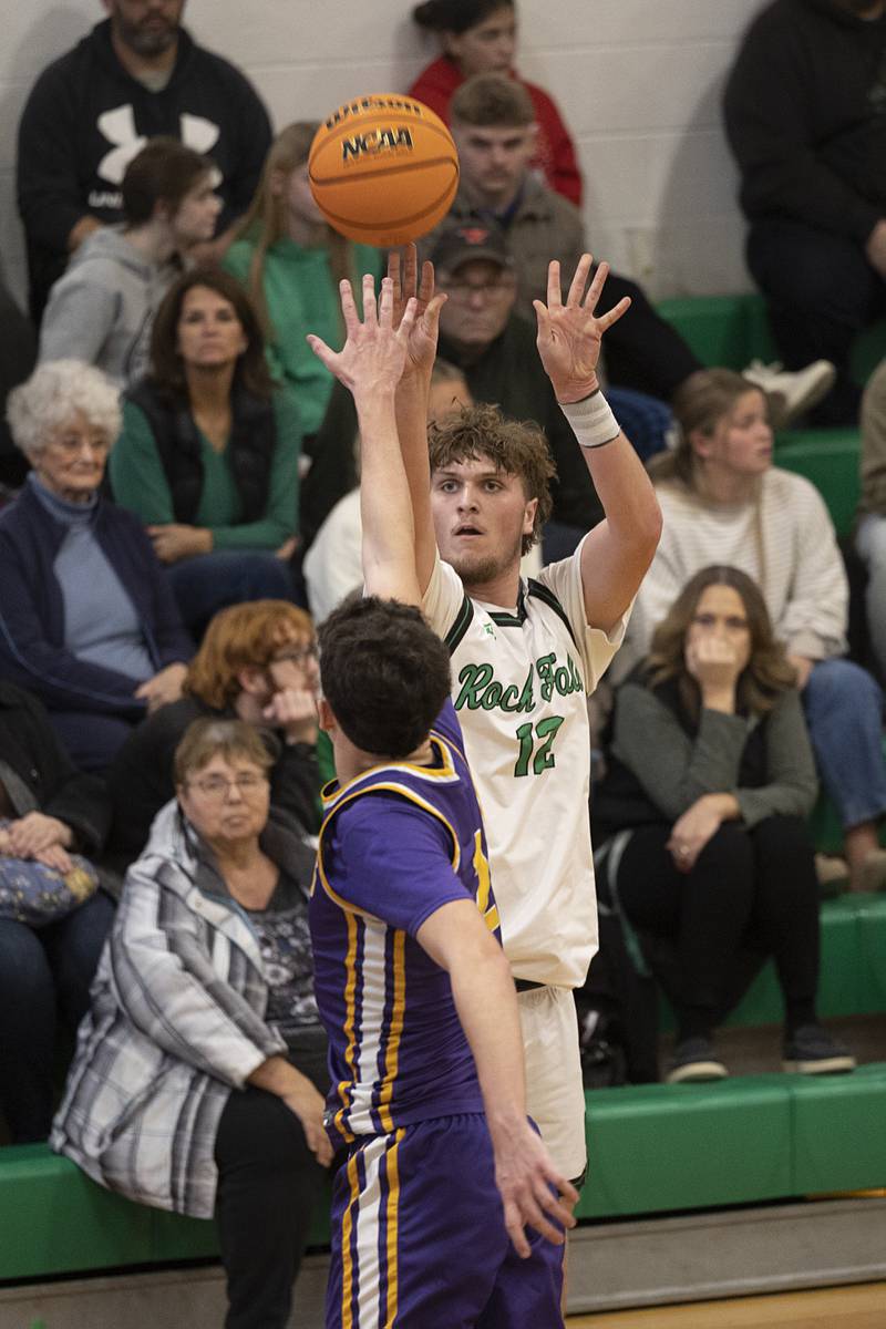 Rock Falls’ Cole Mulnix puts up a shot over a Mendota player Monday, Dec. 15, 2025.
