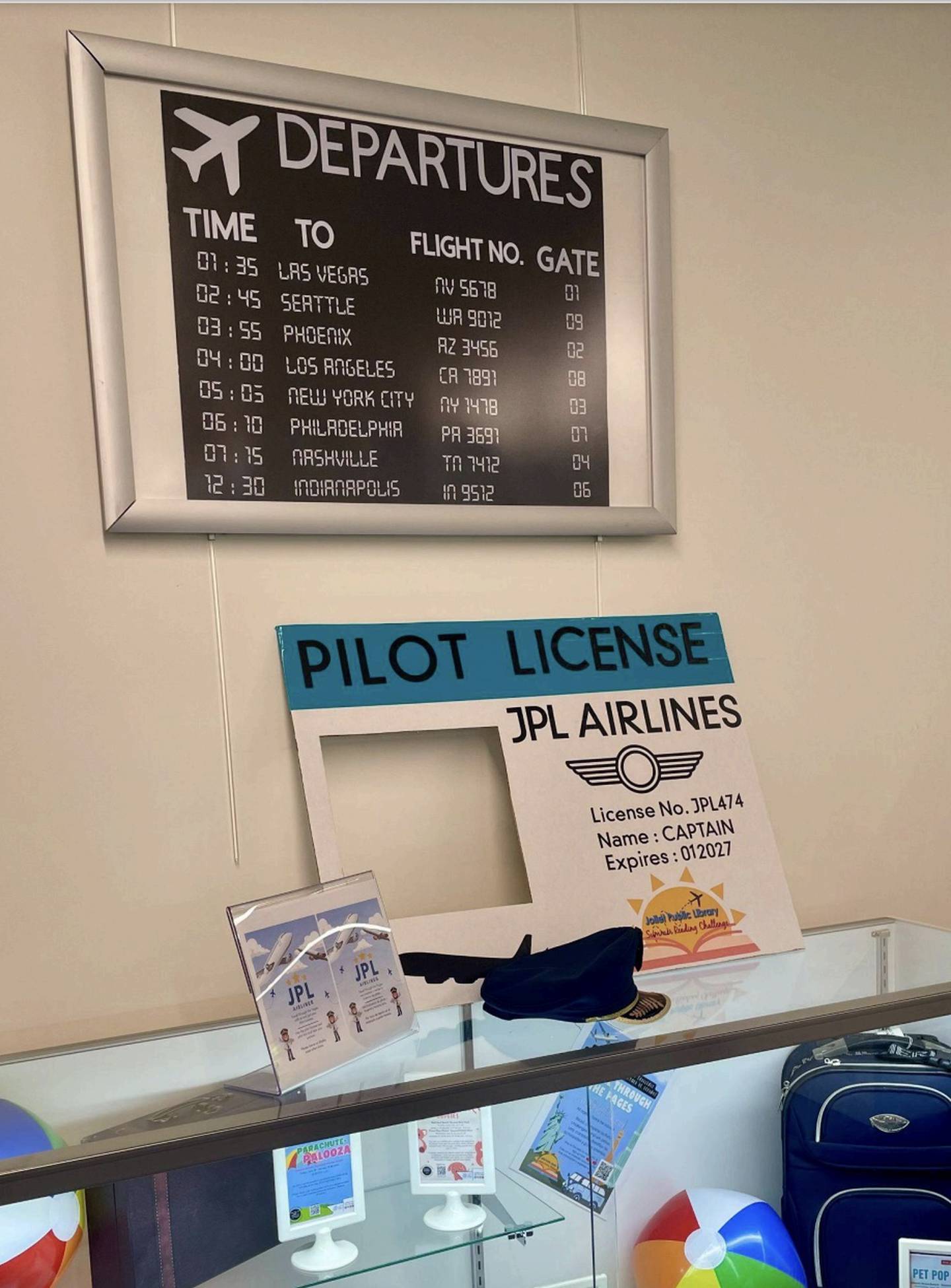 Children can take their picture and get their “pilot license” when they visit the Joliet Public Library's children’s department as part of the Summer Reading Challenge.