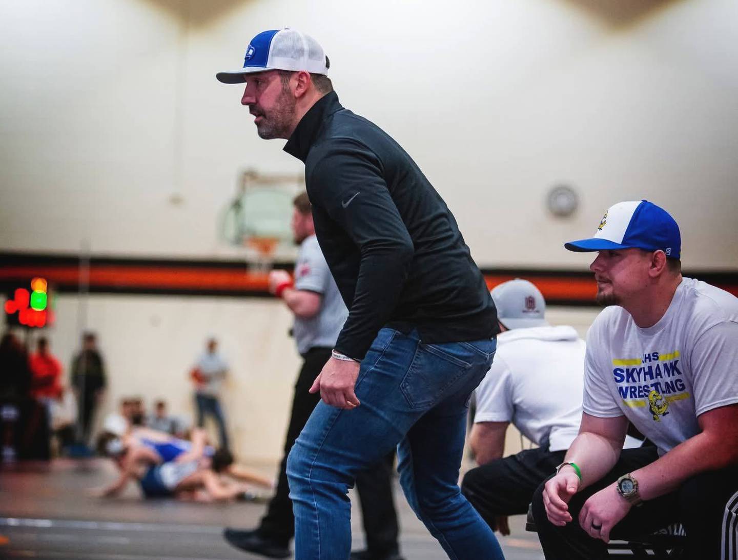 Johnsburg's J.D. Sylvanus, whose Skyhawks went 15-1 and won their first conference boys wrestling title since 1995, is the 2026 Northwest Herald Boys Wrestling Coach of the Year.