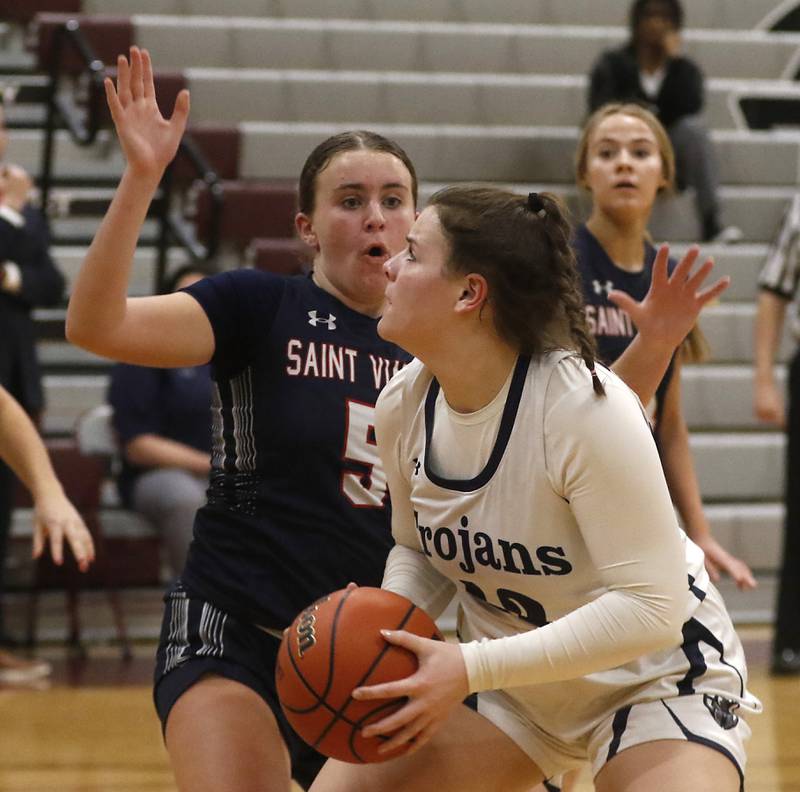 Cary-Grove's Emily Larry goes to the basket against St. Viator's Kyli Ziebka during an IHSA Class 3A Antioch Sectional semifinal girls basketball game on Tuesday, Feb. 20, 2024, at Antioch High School.