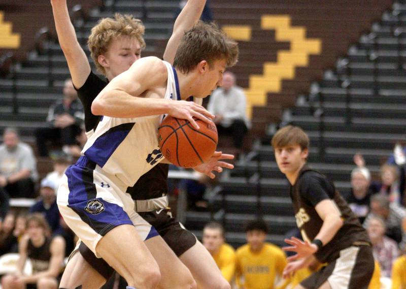 Lake Zurich’s Connor Strauss drives the ball against Jacobs in Hinkle Holiday Classic boys basketball tournament game action at Jacobs High School Tuesday.