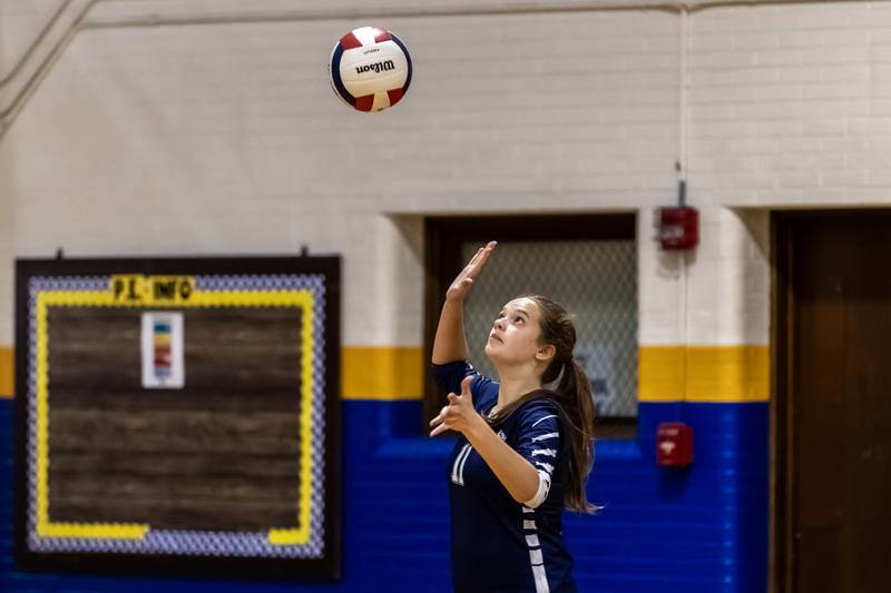 Lisle’s Emily Staley serves during a varsity volleyball away game against Joliet Central on Sept. 22, 2025.