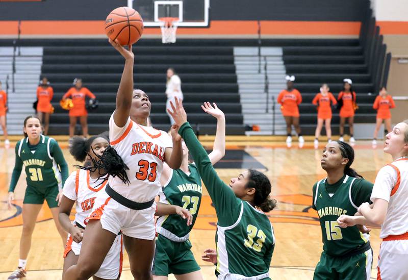DeKalb's Cayla Evans shoots over Waubonsie Valley's Aalyiah Aranda during their game Thursday, Dec. 15, 2022, at DeKalb High School.
