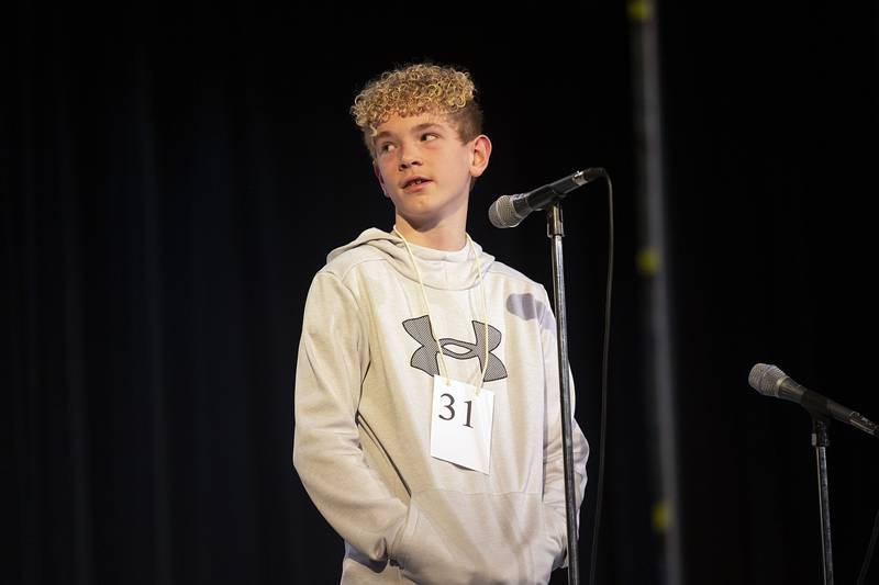 Kings Elementary seventh grader Zachary Johnson appears on stage Thursday, March 9, 2023 during the Lee-Ogle-Whiteside Regional Spelling Bee.