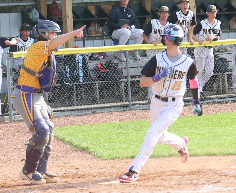 Putnam County's Carter Hochstatter scores a run on Friday, May 8, 2026 at Putnam County High School.