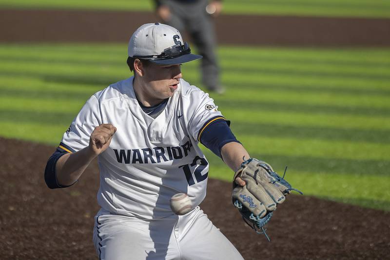 Sterling’s Drew Nettleton is unable to snag a hard shot at third against Newman Wednesday, May 3, 2023.