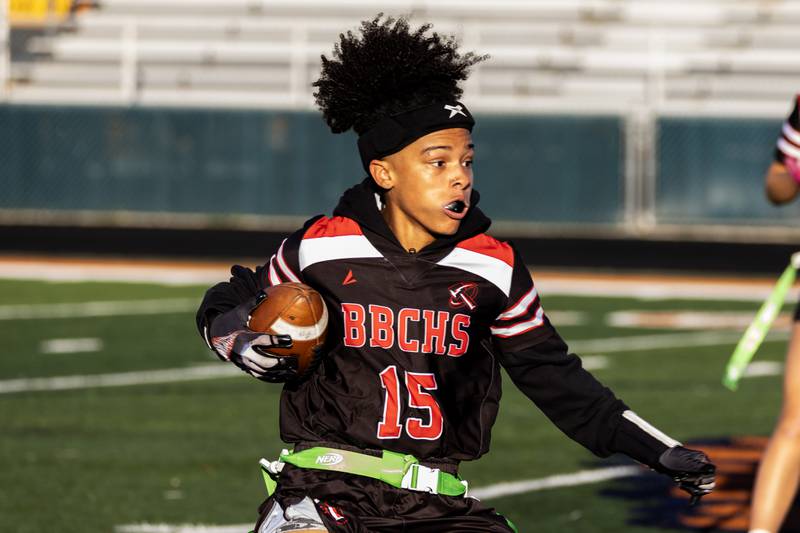 Bradley-Bourbonnais's Nevaeh Brown picks up yardage during a varsity flag football Romeoville Regional semifinal game against Plainfield Central at Romeoville on Oct. 7, 2025.
