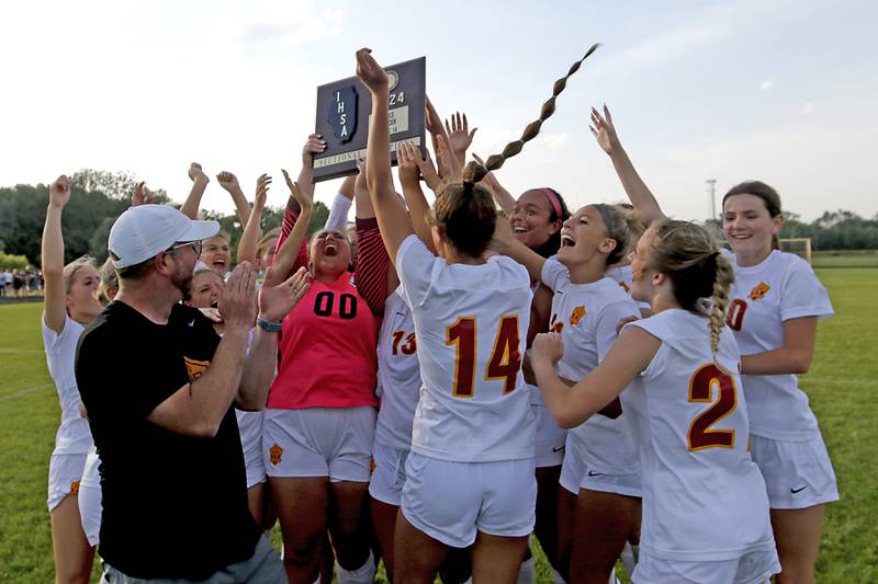 Richmond-Burton celebrates their 3-1 victory over Johnsburg in the IHSA Class 1A Marian Central Sectional Championship match on Tuesday, May 21, 2024, at Marian Central High School.