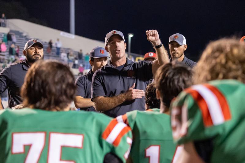 L-P football coach talks to team after loss against Sycamore on Friday, October 11, 2024 at Howard Fellows Stadium in LaSalle.